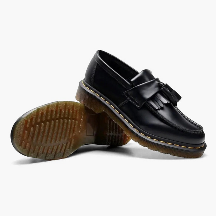 Luna Moda black leather tassel loafers with a thick lug sole and yellow stitching for a classic autumn style