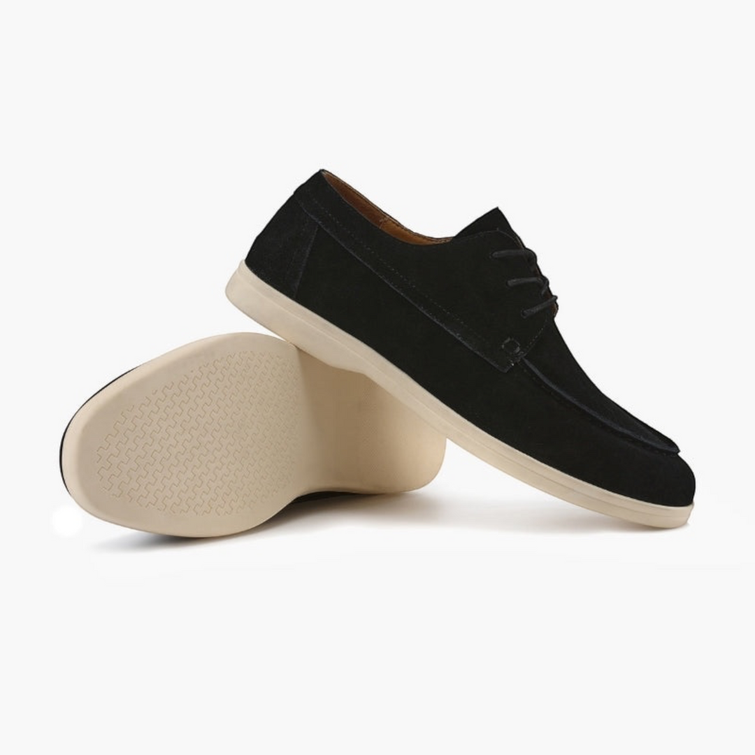 Luna Moda black premium suede lace-up shoes with a lightweight white sole, shown from a side and bottom angle.