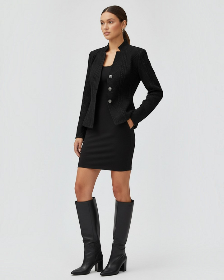 Luna Moda black mid-season coat with a structured silhouette, textured knit pattern, and button-front closure.