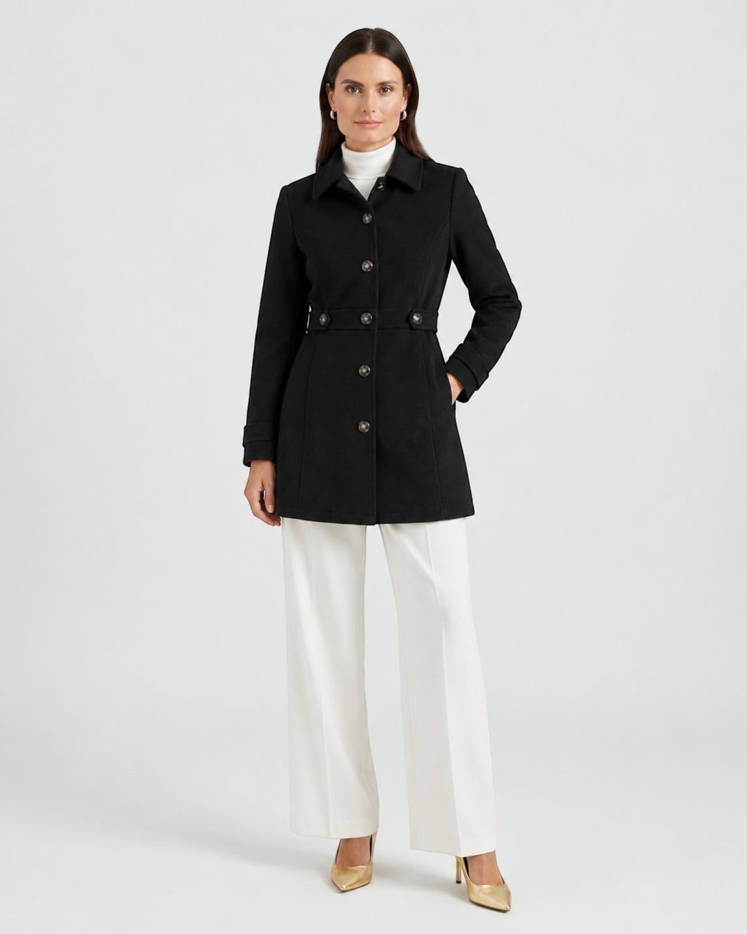 Luna Moda black wool-blend short coat with button closure, worn by a model with white trousers and heels.