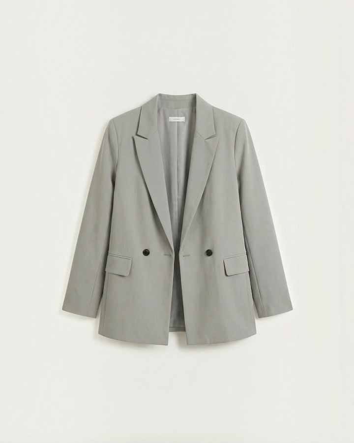 Luna Moda Felicia long grey blazer with tailored waist, padded shoulders, and double-breasted button closure.