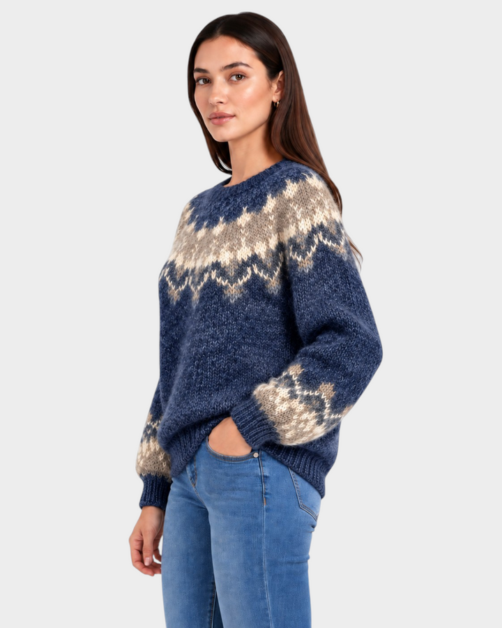 Luna Moda handmade blue Nordic pattern sweater with soft knit texture worn by a woman with blue jeans
