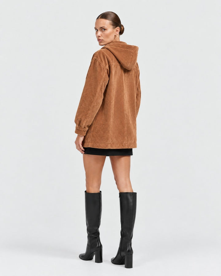 Luna Moda brown corduroy hooded jacket with button closure worn by a model in a studio setting