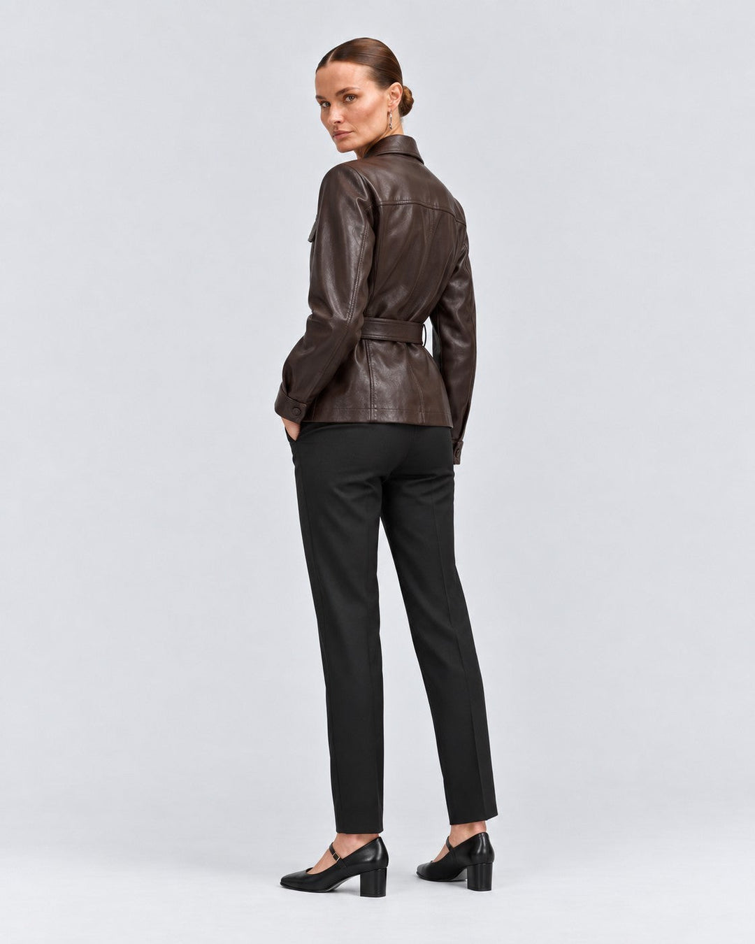 Luna Moda Cristiana brown PU leather jacket with adjustable belt worn by a model, back view