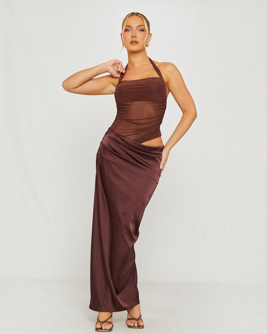 Luna Moda cocoa brown maxi dress featuring a sheer mesh bodice, halter neckline, and a silky satin slip skirt.