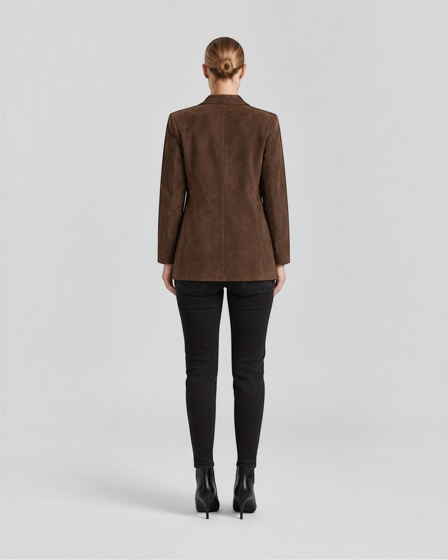 Luna Moda Marta brown suede blazer worn by a woman, back view, paired with black jeans and ankle boots.