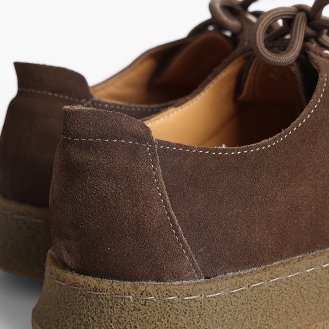 Luna Moda brown suede slip-on moccasins with delicate stitching and textured rubber soles, rear view.