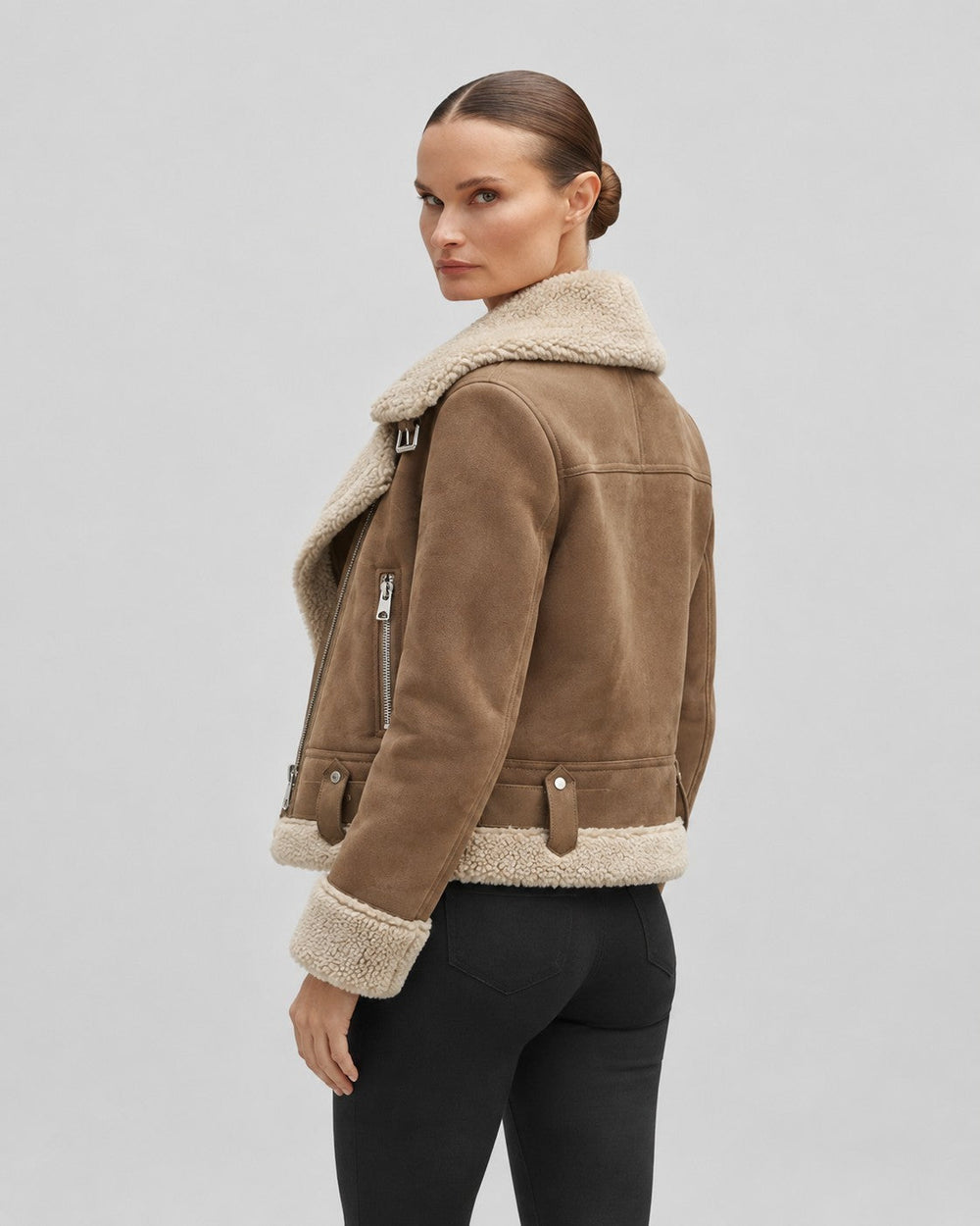 Luna Moda brown suede pilot jacket with soft cream shearling lining worn by a model, back view