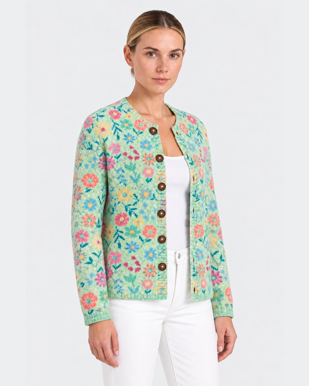 Luna Moda Brunella vintage-inspired cardigan with pastel floral pattern, wooden buttons, and long sleeves on a model.