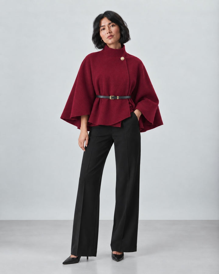 Luna Moda burgundy butterfly sleeve coat with a belted waist worn by a model with black trousers and heels