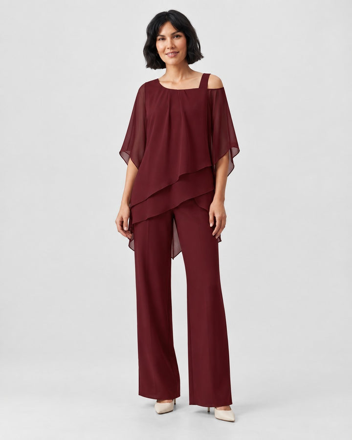 Luna Moda burgundy chiffon two-piece set with a modern layered top and wide-leg trousers worn by a woman