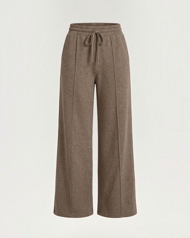 Luna Moda Ada high-waisted brown palazzo pants with wide legs, adjustable drawstring waist, and front seam detailing.