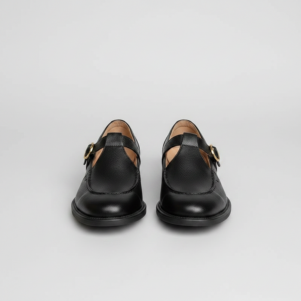 Luna Moda Catarina black leather Mary Jane shoes with a stable heel and elegant buckle strap in a front view.