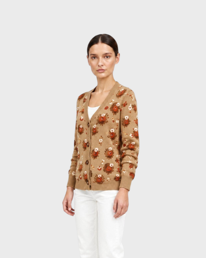 Luna Moda Celia cardigan in tan knit with brown and cream floral pattern, worn with white jeans and black boots.