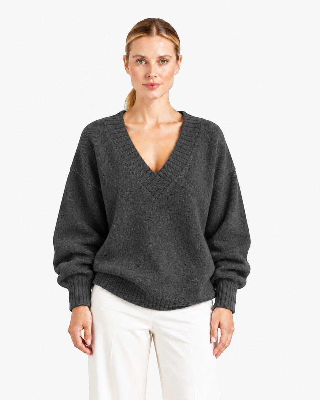 Luna Moda Nadia charcoal grey relaxed fit cashmere blend sweater with a deep V-neck worn by a blonde model
