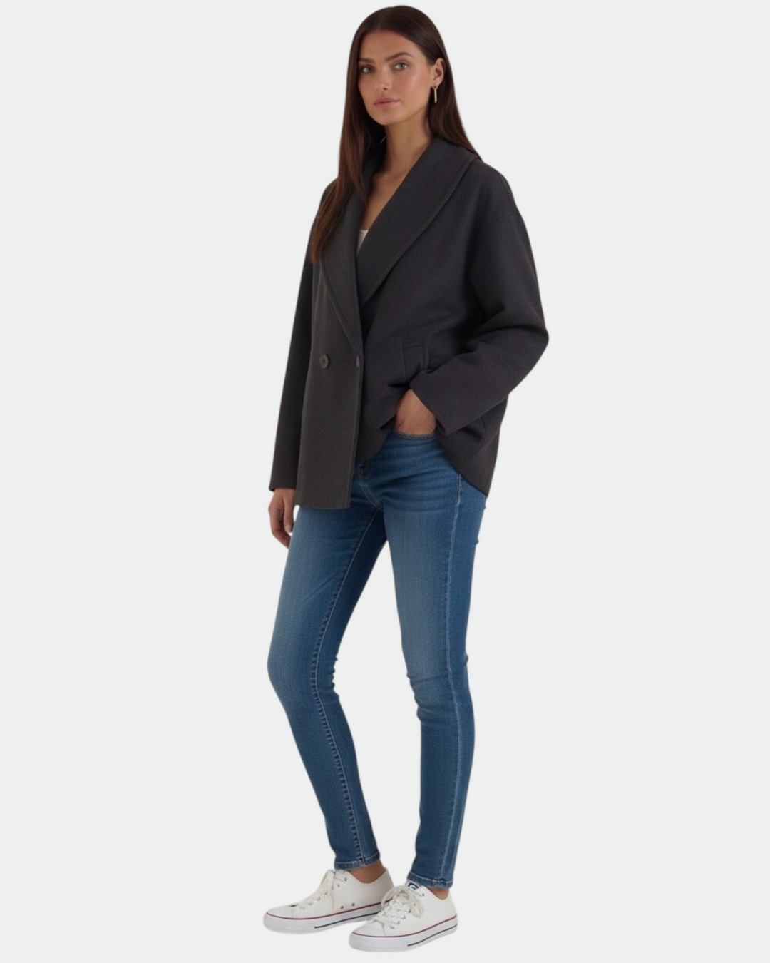 Model wearing a Luna Moda Corinna charcoal grey oversized coat with a wide collar, paired with blue jeans and sneakers