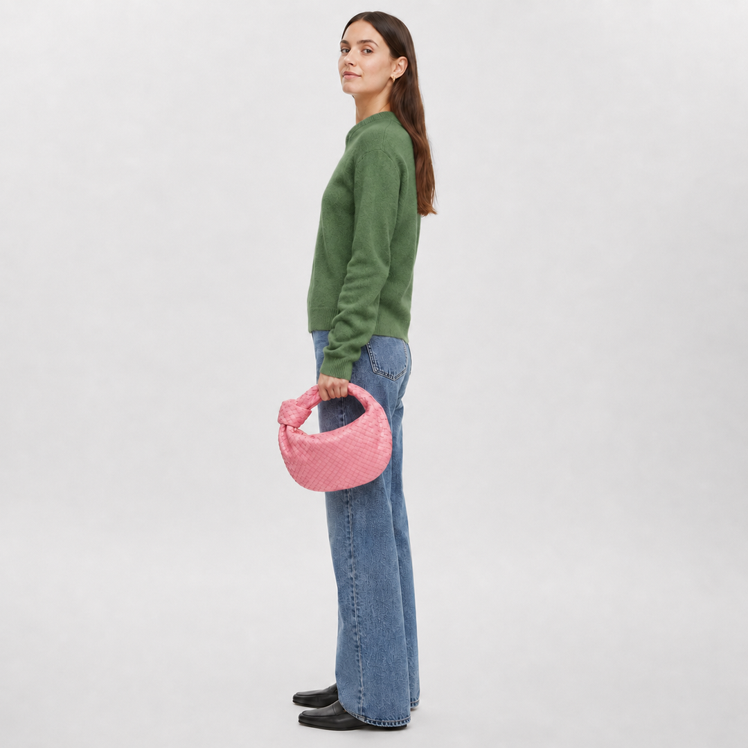 CHIARA di Luna Moda, borsa intrecciata con nodo, colore rosa, portata a mano.