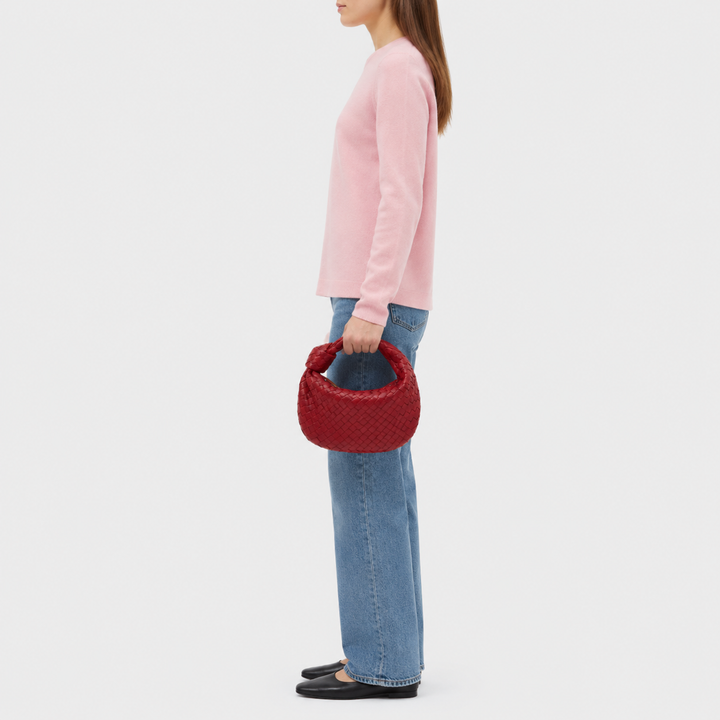 CHIARA di Luna Moda, borsa intrecciata con nodo, colore rosso, portata a mano.