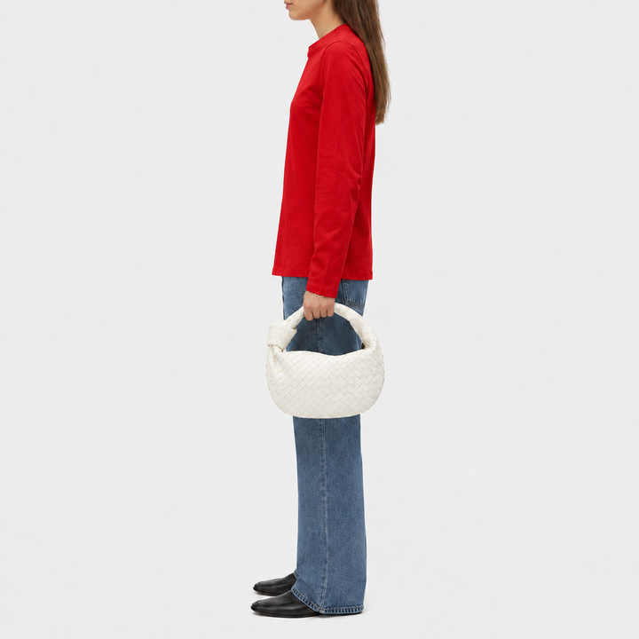 CHIARA di Luna Moda, borsa intrecciata con nodo, colore bianco, portata a mano.
