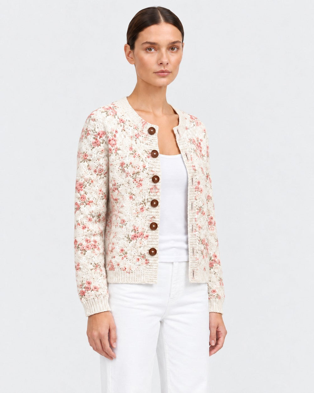 Luna Moda Claudia cream knit cardigan featuring a vintage pink rose floral print and dark tortoise shell buttons.