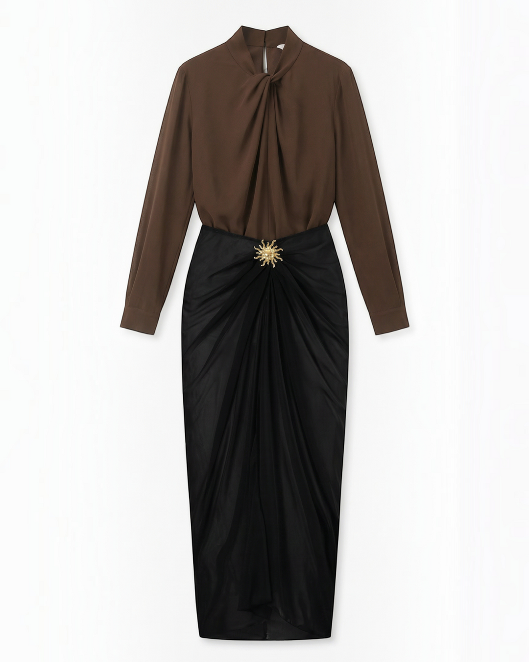 Luna Moda midi skirt in black with draped fabric and a gold sun-shaped brooch, paired with a brown long-sleeve top.
