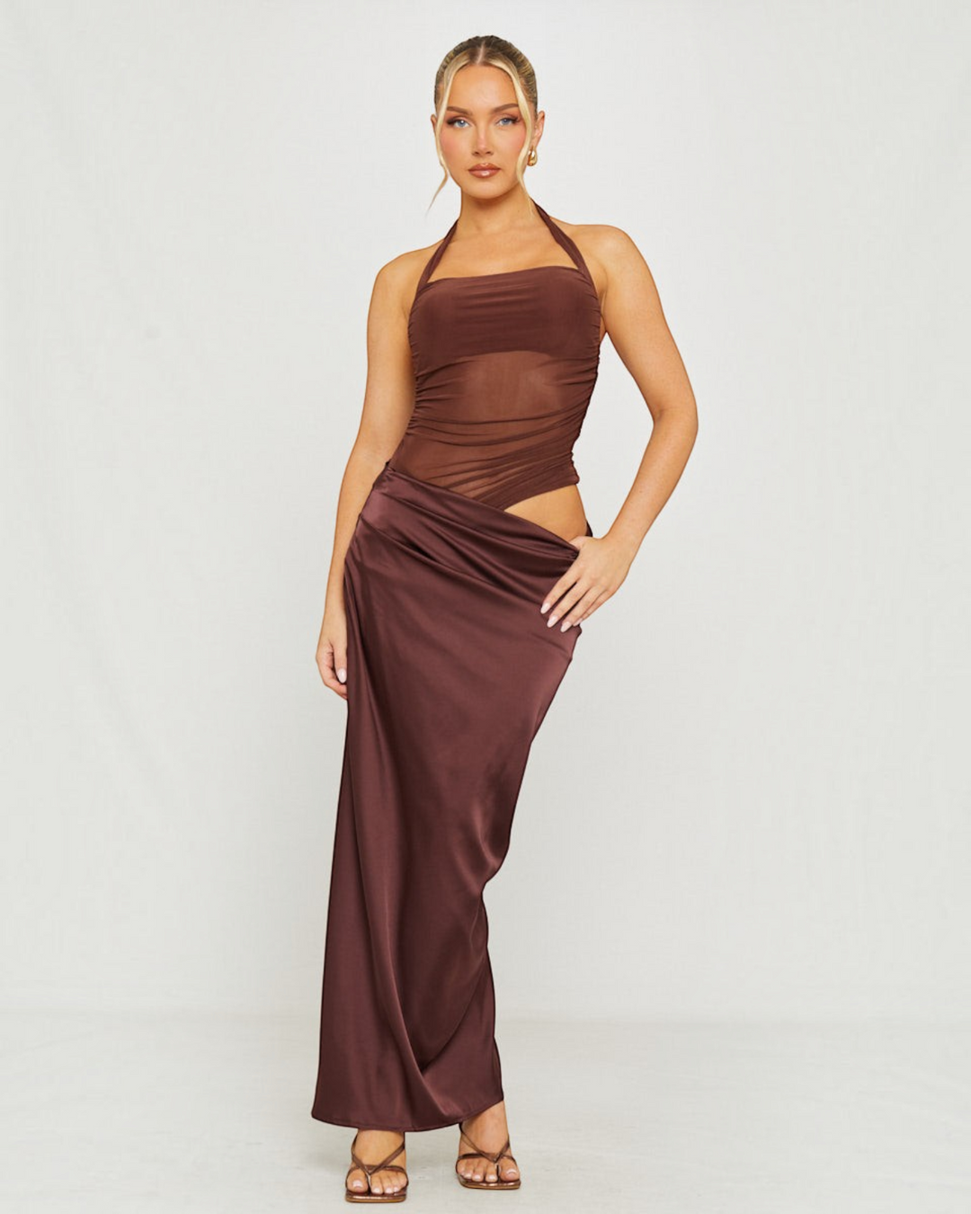 Luna Moda cocoa brown maxi dress with a sheer mesh bodice, halter neckline, and flowing satin slip skirt.