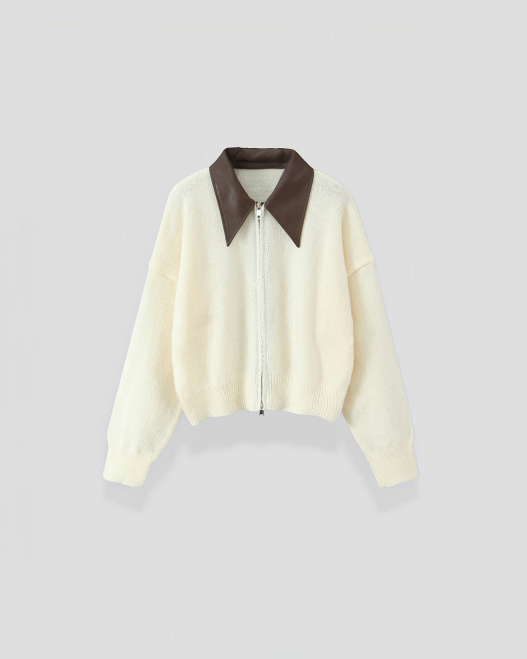 Luna Moda cropped cardigan in cream knit with a contrasting brown collar and double zip front closure.