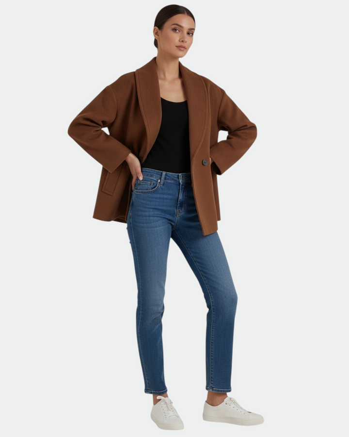 Luna Moda Corinna brown oversized wool-blend coat with a relaxed fit worn by a model with jeans and white sneakers