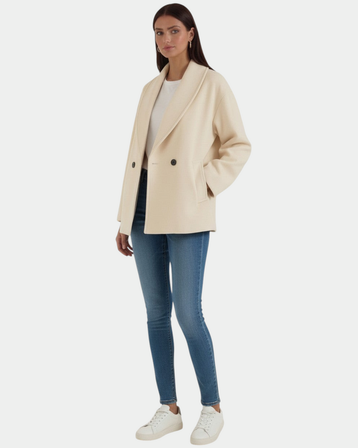 Luna Moda Corinna cream oversized wool-blend coat with shawl collar worn by a model with jeans and white sneakers