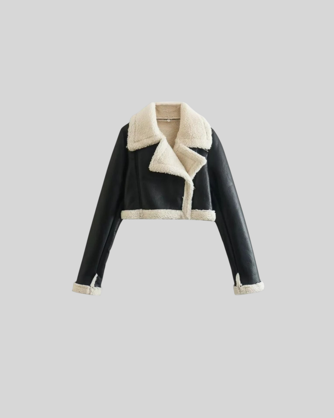 Luna Moda black cropped jacket with soft cream fleece lining and wide collar for a stylish winter look