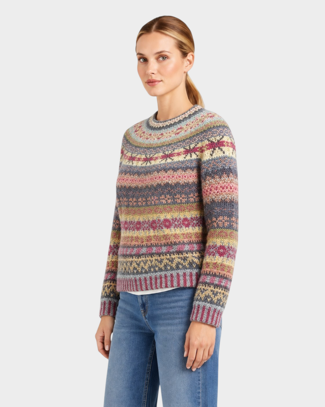 Luna Moda Debora crewneck sweater featuring a colorful Icelandic-inspired mélange knit pattern on a model.