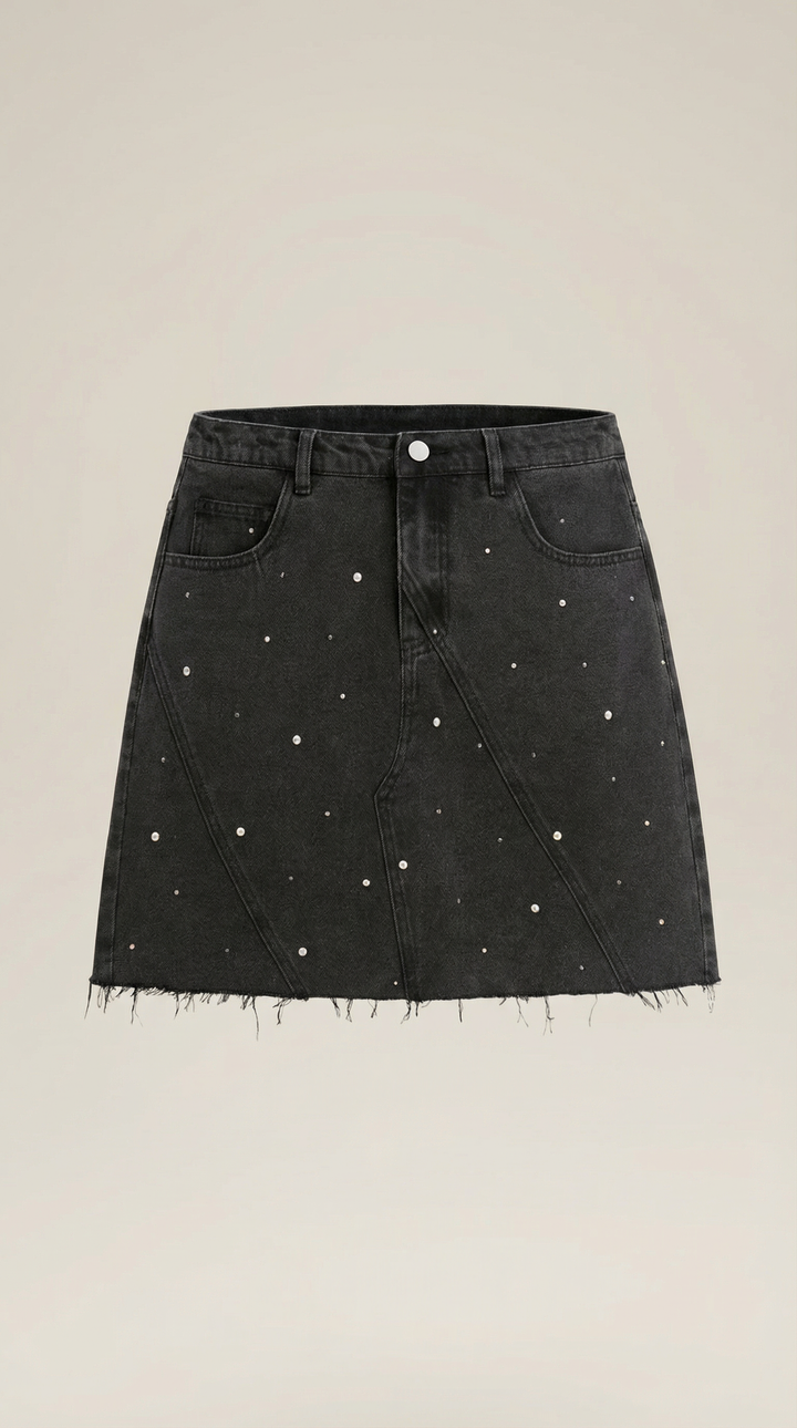 Kaia – Minigonna in denim con perle e orlo sfrangiato