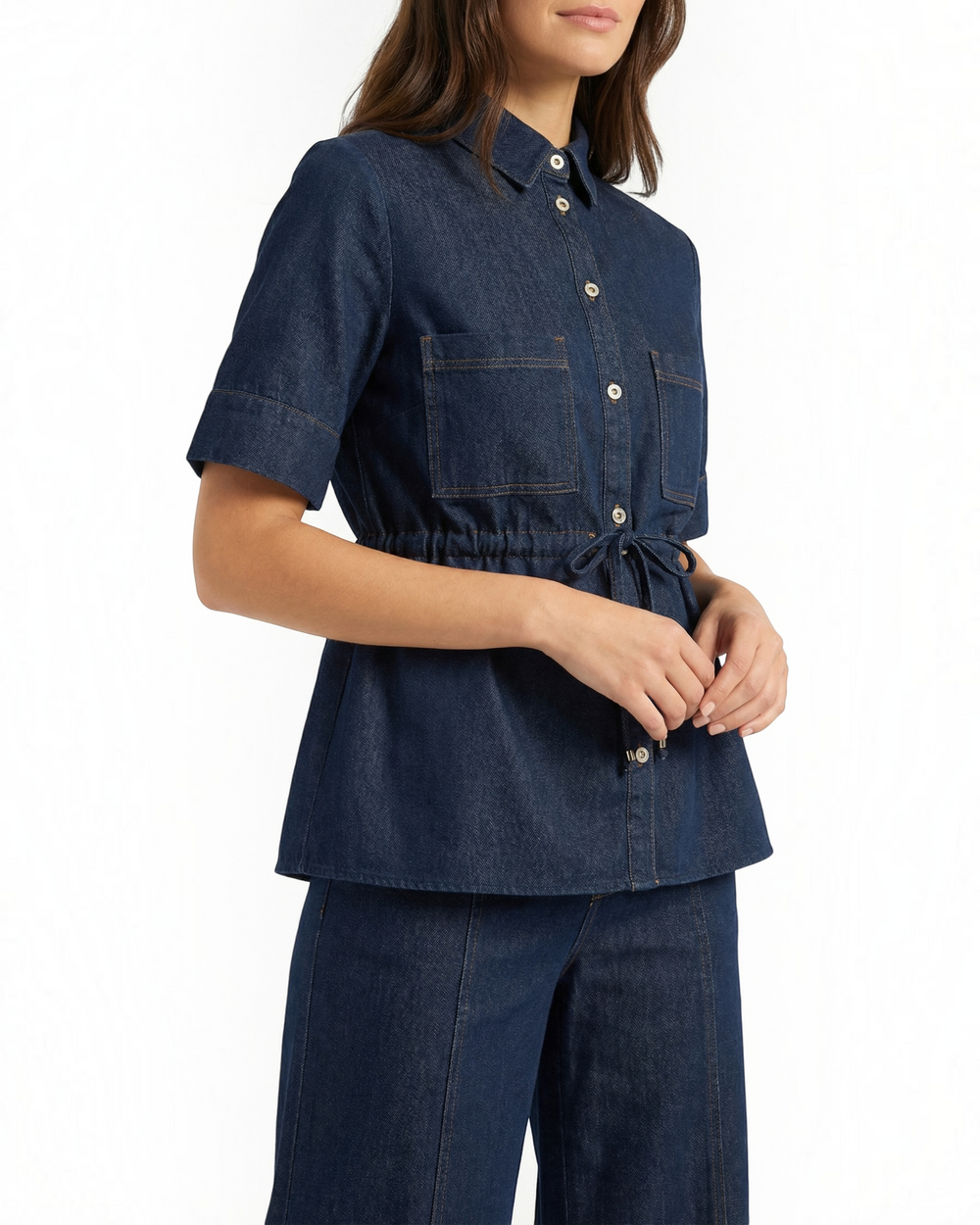 Luna Moda dark denim shirt with short sleeves, button-down front, chest pockets, and a drawstring waist.
