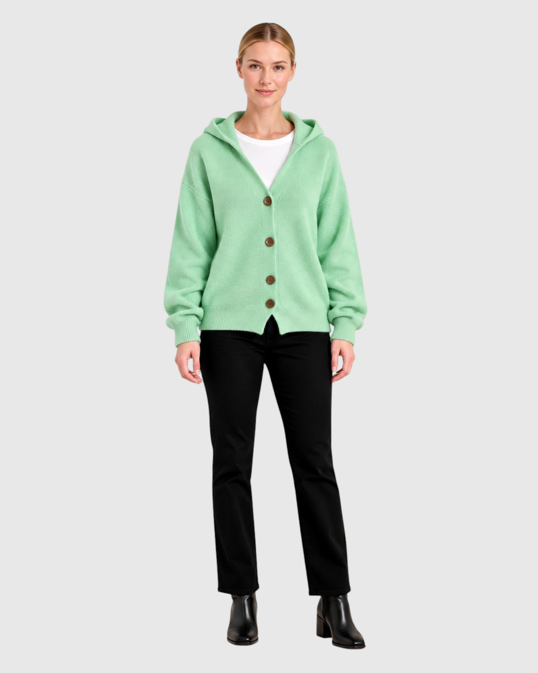 Luna Moda Diana light green cotton hooded cardigan with front buttons worn by a model with black trousers