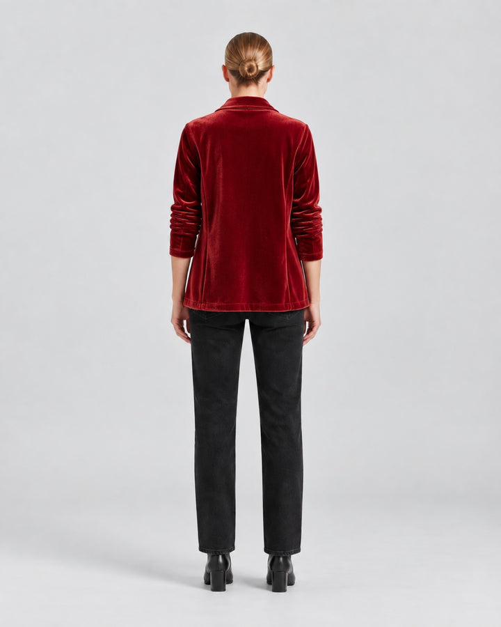 Luna Moda Donatella velvet blazer in deep red, worn by a model from the back with black jeans and boots.