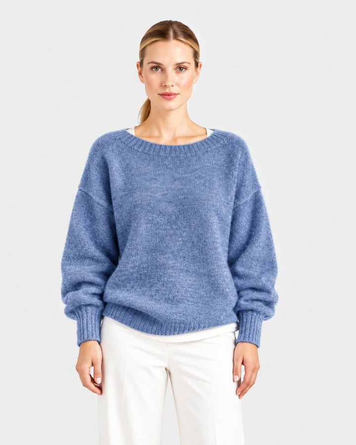 Luna Moda Elda blue crew neck sweater with a soft, relaxed fit worn by a model against a neutral background.