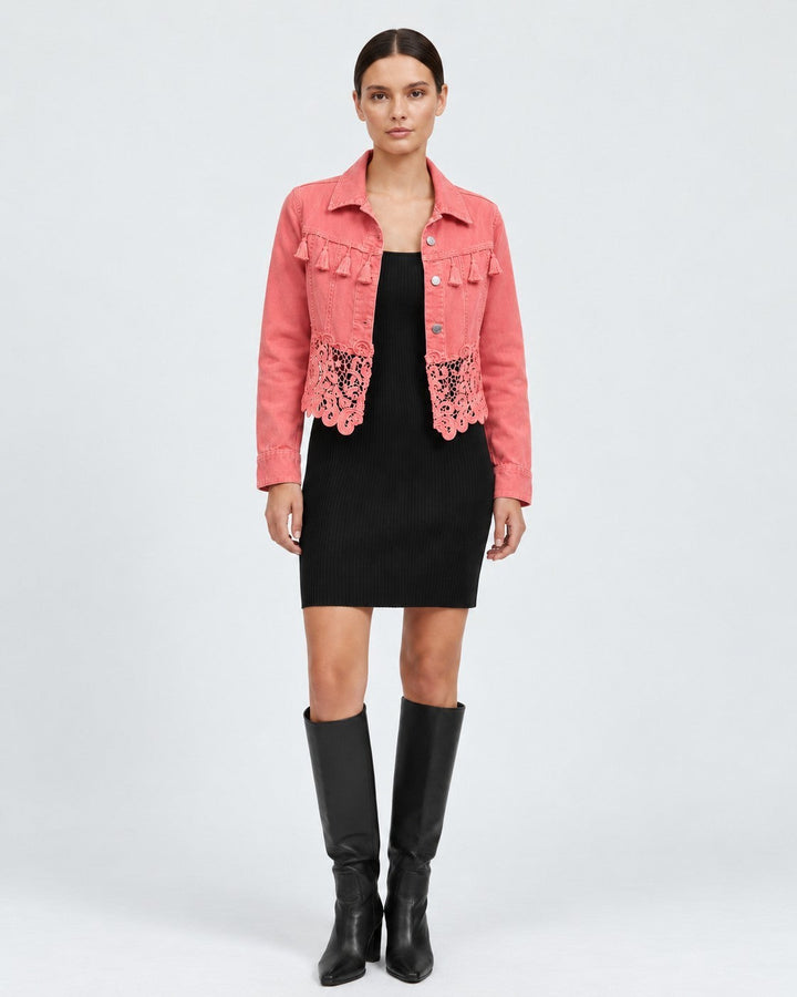 Luna Moda Elisabetta coral denim jacket with fringe chest detail and intricate lace hem worn over a black dress