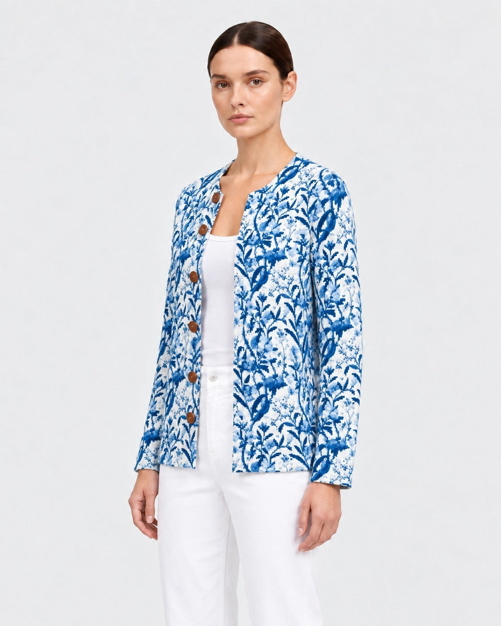 Luna Moda Emilia cardigan featuring a blue and white vintage botanical print with wooden buttons on a model