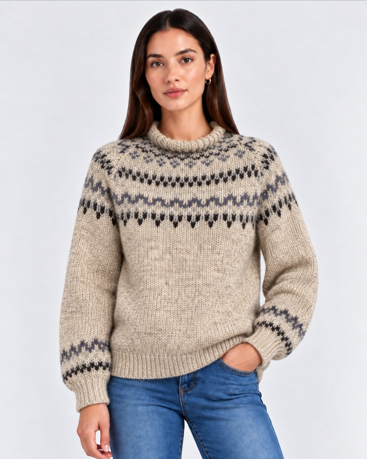 Luna Moda Erica handmade beige jacquard high neck sweater with grey and black geometric patterns worn by a model