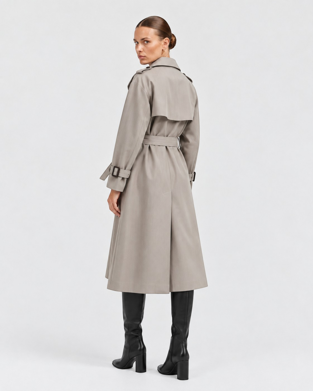 Luna Moda Eulalia beige double-breasted trench coat with belt worn by a model, back view