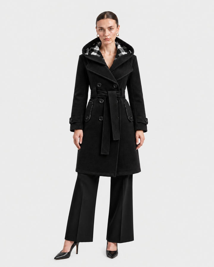Luna Moda Evelina black hooded winter coat with a belted waist and plaid lining worn by a model.