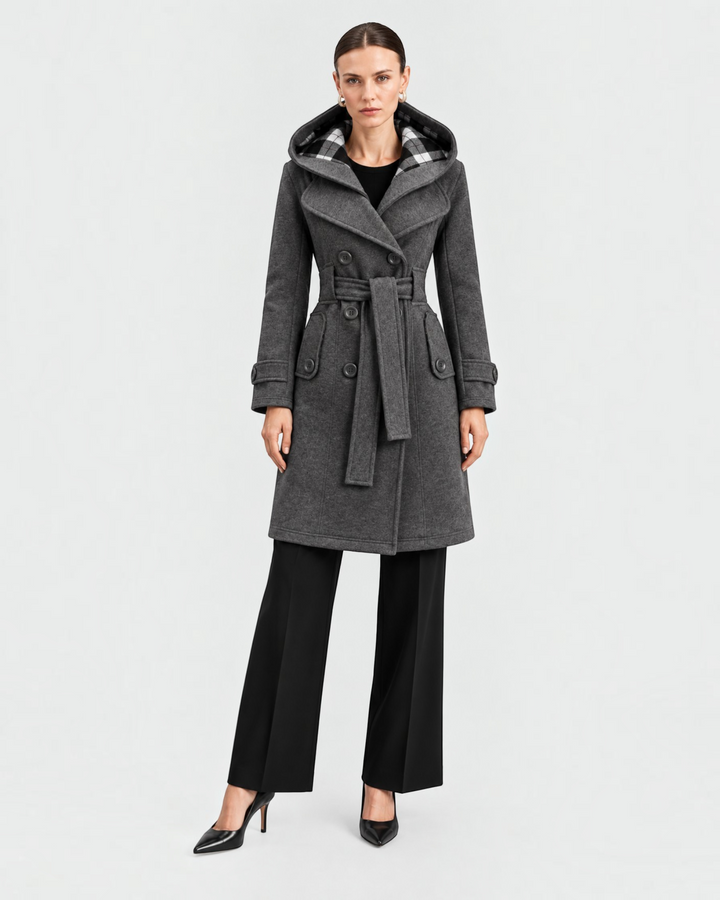 Luna Moda Evelina grey wool-blend winter coat with a hood, belted waist, and plaid lining worn by a model.
