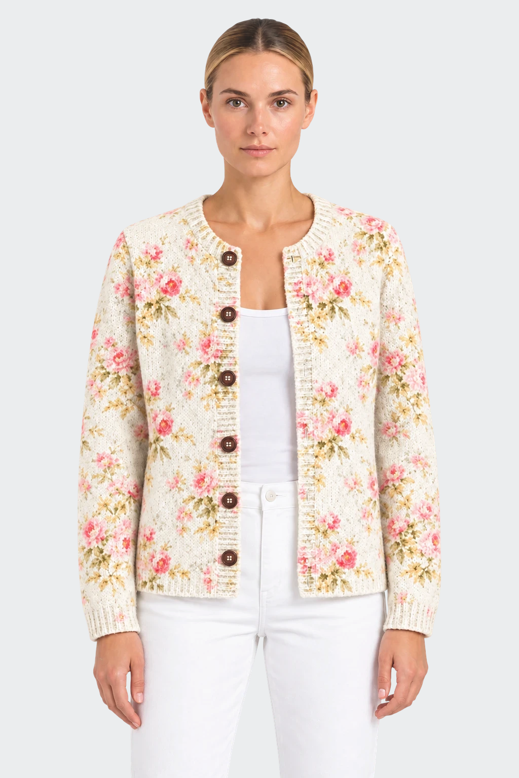 Luna Moda Fabiola cardigan in cream with pink floral print, featuring dark tortoise buttons and ribbed trim.