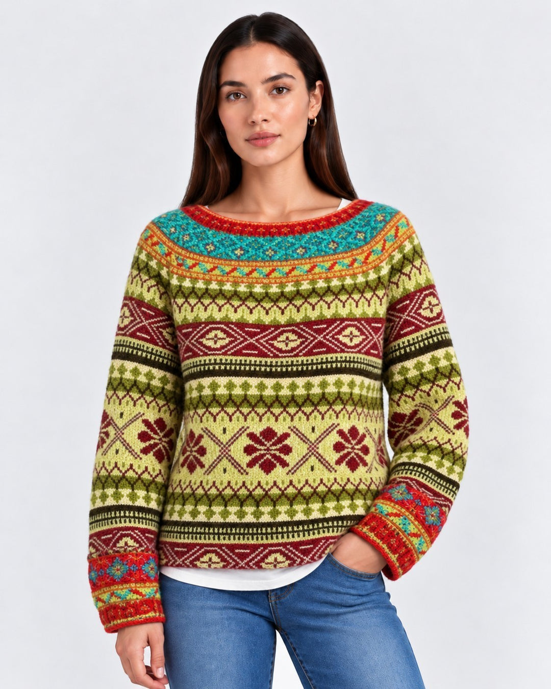 Luna Moda Flavia handmade wool sweater featuring a vibrant retro Nordic pattern in green, red, and turquoise.