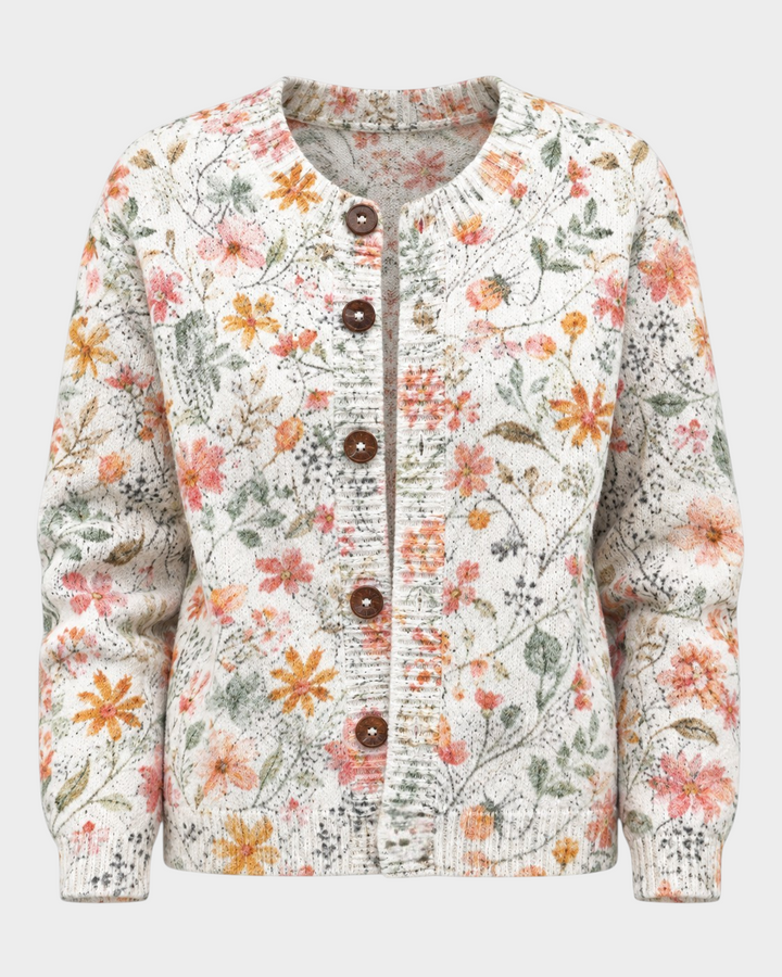 Luna Moda Anita cardigan with watercolor floral print in pink, peach, and sage on a soft knit fabric with wood buttons.