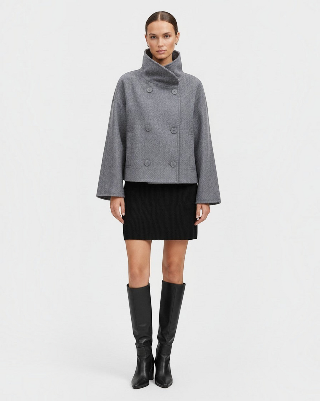 Luna Moda Francisca grey mid-season coat with a wide collar and double-breasted button closure on a model
