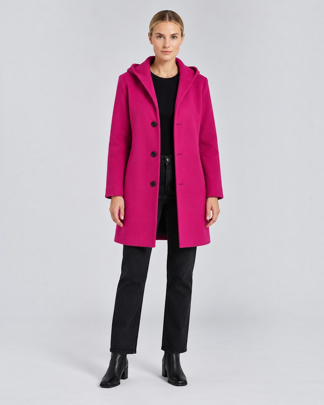 Luna Moda short fuchsia hooded coat with button closure worn by a model with black jeans and boots