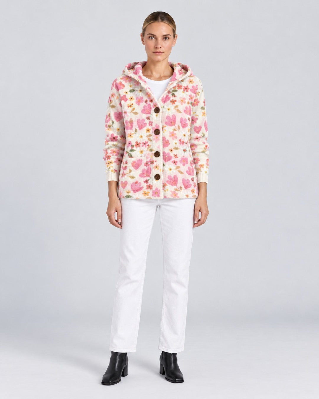 Luna Moda Gaia hooded knit cardigan featuring a cream base with pink heart and floral patterns and button front.