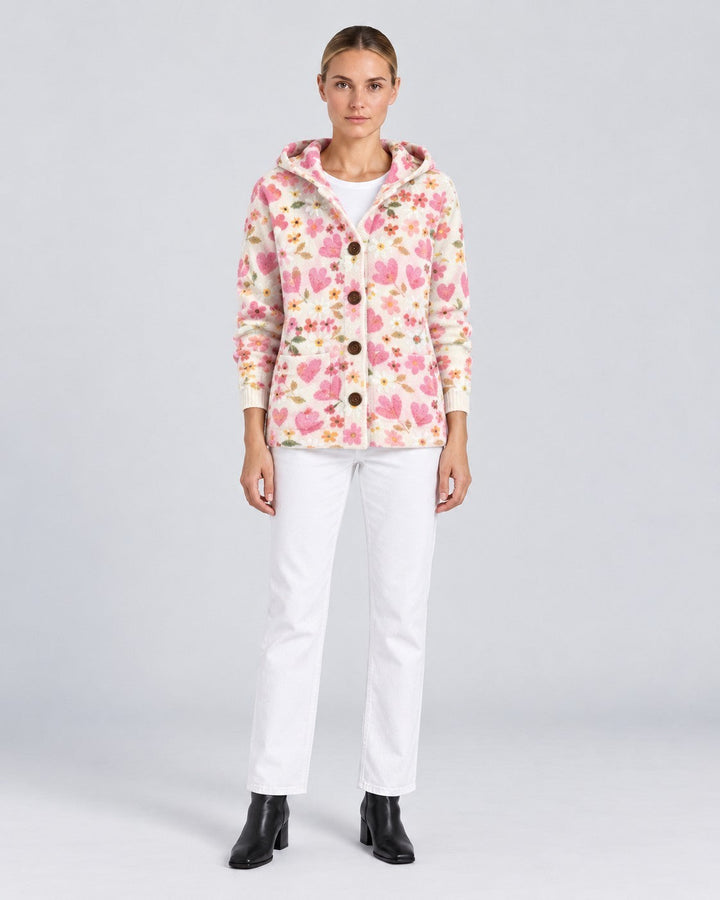Luna Moda Gaia hooded knit cardigan featuring a cream base with pink heart and floral patterns and button front.