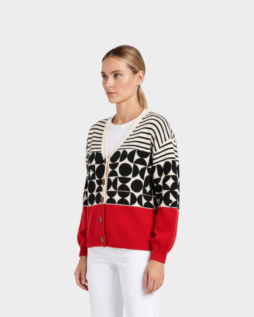 Luna Moda Greta button-up cardigan featuring a geometric black, white, and red knit pattern on a model